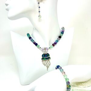 Squid penant with abalone insets on fluoride strand plus bracelet and earrings